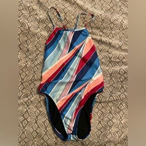 Jolyn Raya onesie. Size 34. Red, White, Blue.